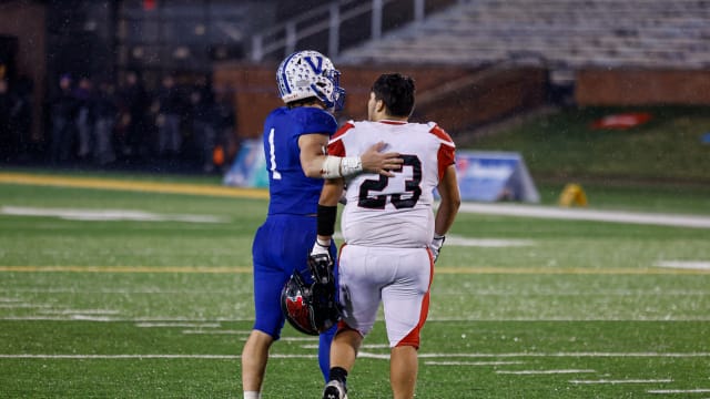 Valle Catholic's Alex Viox and Lamar's Mario Delapena